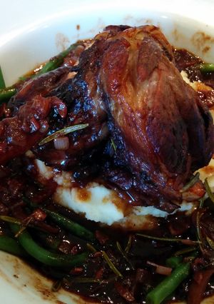A picture of Lamb Shanks braised in Red Wine.