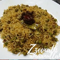 A picture of Sambar Masala and Green Peas Rice.