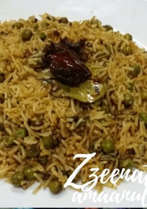 A picture of Sambar Masala and Green Peas Rice.