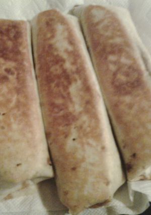 A picture of Chili cheese burritos.