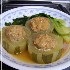 A picture of Simmered Green or White Winter Melons, Cabbage Roll-style.