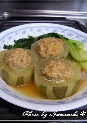A picture of Simmered Green or White Winter Melons, Cabbage Roll-style.