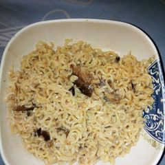Indomie cooked with dry fish A picture of Indomie cooked with dry fish.