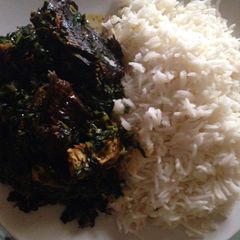 A picture of BASMATI RICE with local vegetable sauce.