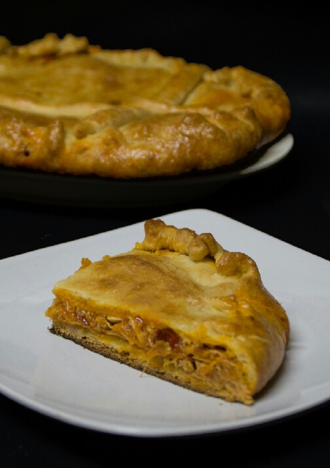 Una foto de Empanada de pollo al curry