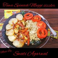 A picture of Tawa spinach Maggi sizzler.