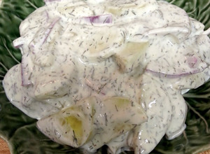 A picture of Cucumber Salad in Dill Sour Cream Sauce.