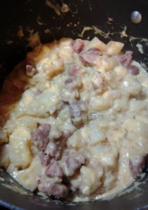A picture of Sautéed Sausage and Potatoes w/cheese.