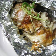 A picture of Salmon Cooked In Foil With Creamy Miso and Cheese.