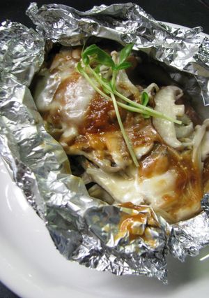 A picture of Salmon Cooked In Foil With Creamy Miso and Cheese.