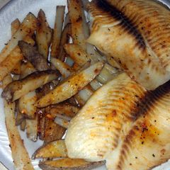 A picture of fish and fries.