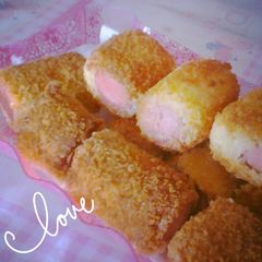 A picture of Sausage in breadcumbed french toast.