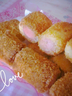 A picture of Sausage in breadcumbed french toast.