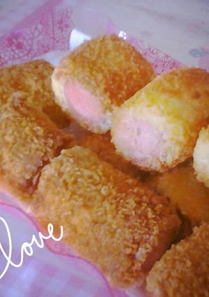 A picture of Sausage in breadcumbed french toast.