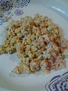 A picture of Fried ham and egg salad.