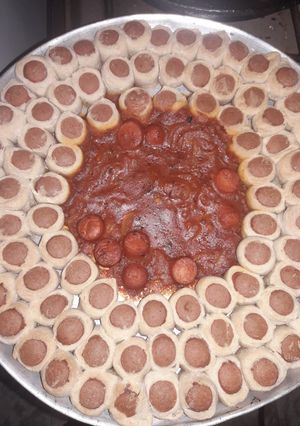 Una foto de Rosca de salchichas. Masa 3 ingredientes multiuso. Económica