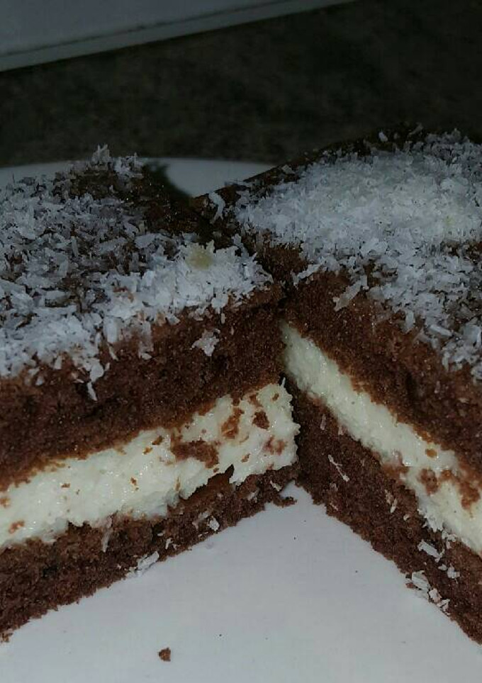 Una foto de Bizcochada rellena de crema de coco