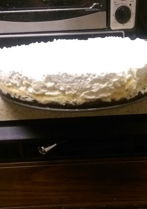 A picture of Vanilla bean cheesecake w/ white chocolate mousse..