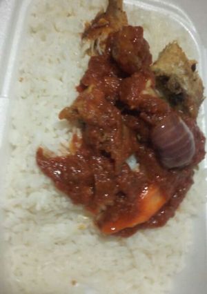 A picture of White rice and croka fish.