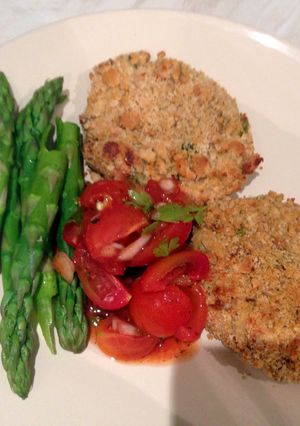 A picture of Salmon fishcakes and salsa.