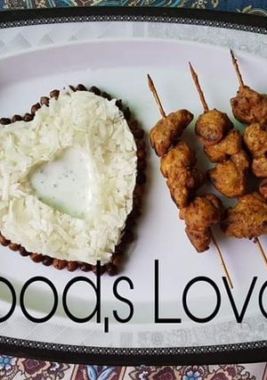 A picture of Beef pakora on skewers.
