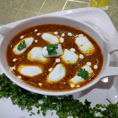 Chena rasgulla in gravy A picture of Chena rasgulla in gravy.