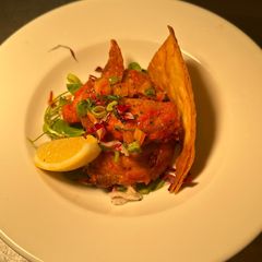 A picture of Peri Peri Chicken wings.