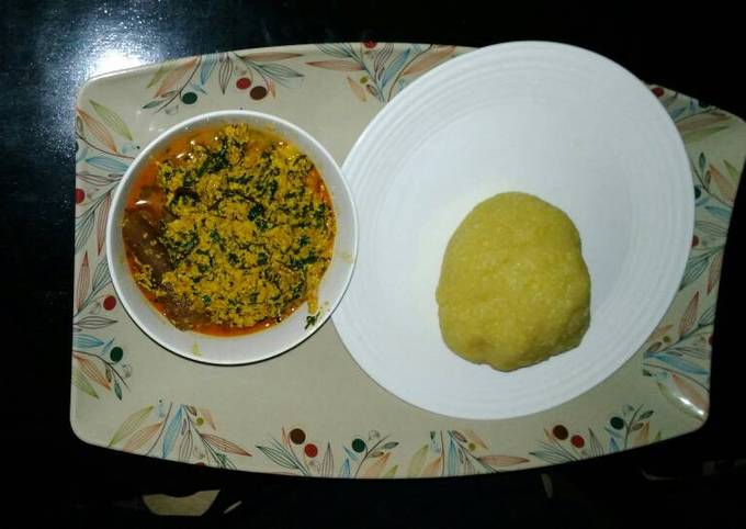 Egusi soup with yellow garri