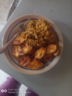 A picture of Beans And Fried Plantain.