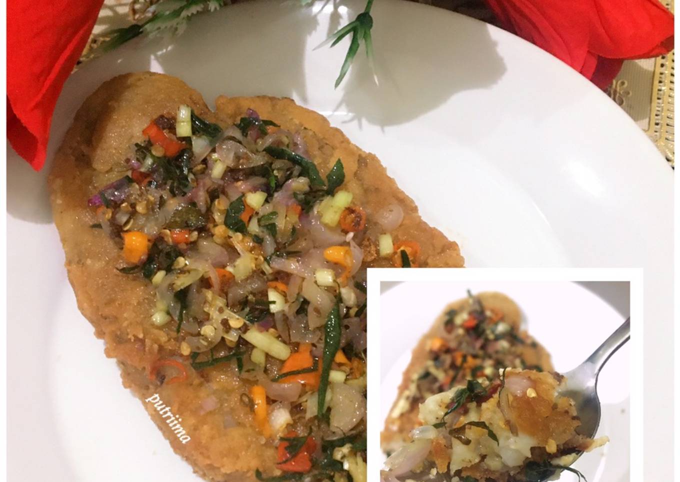 Ibu memegang ikan: Dory