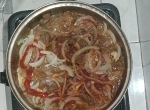 Una foto de Higado de res encebollado