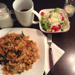 A picture of Mini Bow tie Chicken And Spinach Tossed In A Red Mushroom Sauce.