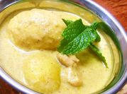 A picture of boiled egg curry