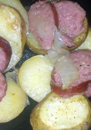 A picture of potatoes and sausage.