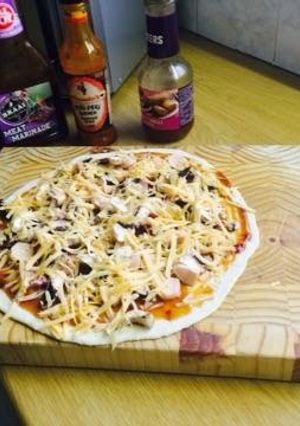 A picture of Mama's delight - Pizza.