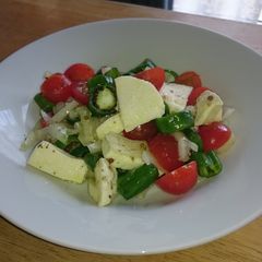 A picture of Padron and Tomato Salad.