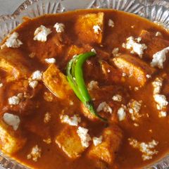 A picture of Paneer in tomato almond gravy.