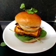 A picture of My Big Chicken, Halloumi,Bacon,Red Cheese Slice on Brioche Bun🤩.