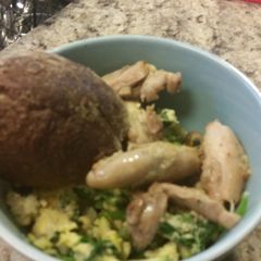 A picture of Zucchini scramble with chicken & artisan bread.