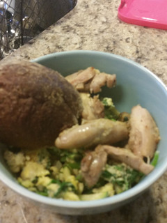 A picture of Zucchini scramble with chicken & artisan bread.