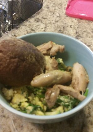 A picture of Zucchini scramble with chicken & artisan bread.