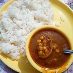 A picture of Chana masala with fat free rice.