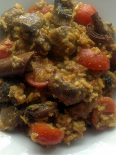 A picture of sig's mushroom and tomato biryani.