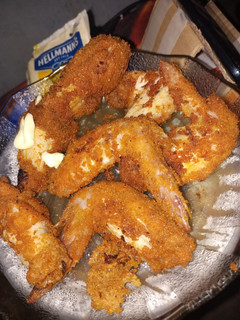 Una foto de Alitas fritas exquisitas