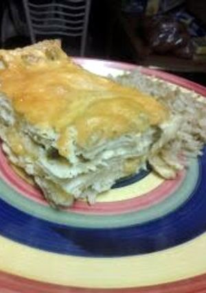 A picture of green Chile chicken enchiladas.