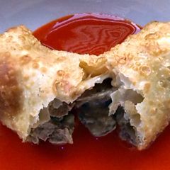 A picture of Cheese steak egg roll.