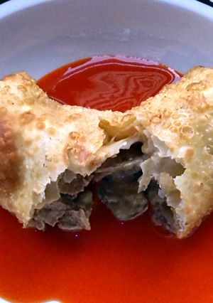 A picture of Cheese steak egg roll.