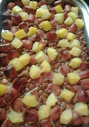 A picture of Bake beans, hotdogs, and pineapple casserole.