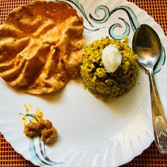 A picture of Green Moong Dal Masala Khichadi In Pressure Cooker.