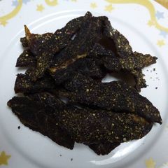 A picture of Lee's Sweet And Spicy Cola Pepper Beef Jerky.